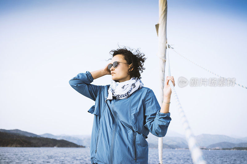 Woman sailing on a windy day